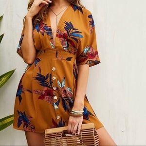 Yellow splurging neck with tie back floral dress